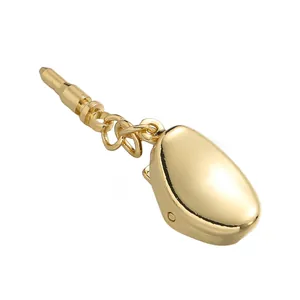 Close-up of polished 18K gold plated jewelry clip connector with termination pin
