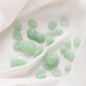 Assorted Chinese style imitation jade glass pendants for DIY jewelry making.