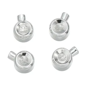 Set of four silver metal jewelry end caps for DIY necklace and bracelet crafting.
