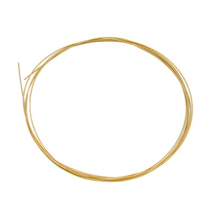 Close-up of 18K gold-plated steel beading wire for DIY jewelry making and pearl threading.