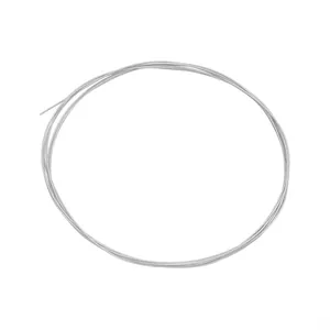 Detailed macro view of thin silver metallic jewelry wire coil for DIY beading and craft projects