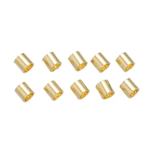 Close-up of 10 gold-plated 18K cylindrical DIY jewelry end bead accessories