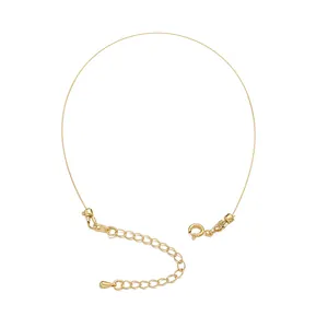 Detail of 18K gold plated wire necklace finding with lobster clasp and extension chain.