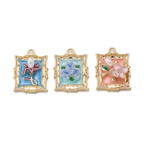 Detailed view of vintage alloy photo frame flower charms with enamel and faux pearl detail