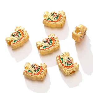 Golden alloy dragon head spacer beads with vibrant enamel details for DIY jewelry crafting