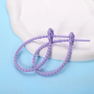 Purple paw-shaped silicone cable tie for cable organization and cute doll accessories