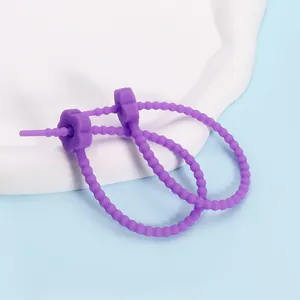 Two-piece set of purple adjustable silicone cable ties with floral buckle design