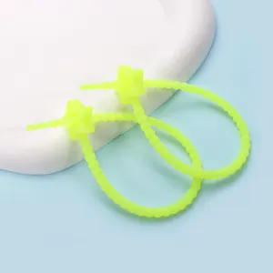 Neon yellow silicone star cable tie for cable organization and bag charm accessories