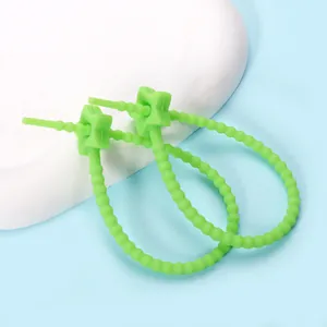 Durable green star-shaped silicone cable tie and bead wire organizer for doll bags