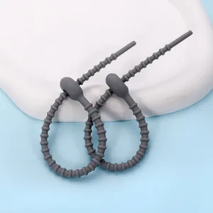 Gray silicone cable tie fasteners for cable management and DIY storage