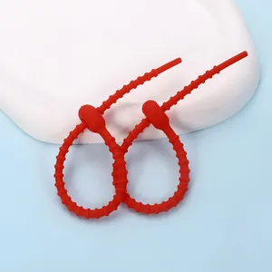 Durable red silicone reusable cable ties for doll accessories and cord management