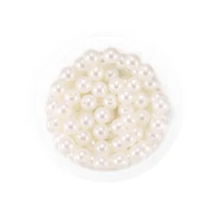 White round ABS imitation pearl beads with straight holes for DIY jewelry and crafts.