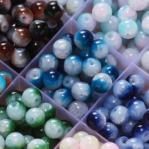 Macro view of 8mm colorful ice crackle glass beads organized for DIY jewelry making