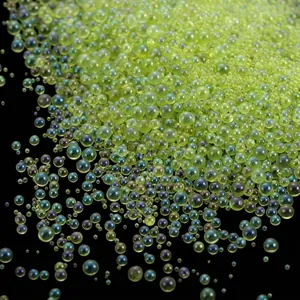 Macro detail of iridescent transparent glass bubble beads for DIY nail art crafts