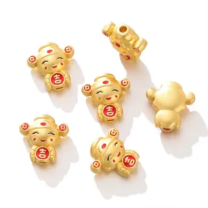 Matte golden lucky boy character spacer beads for DIY jewelry making with red enamel