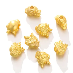 Stylized golden dragon head beads with Fu blessing characters for DIY jewelry making