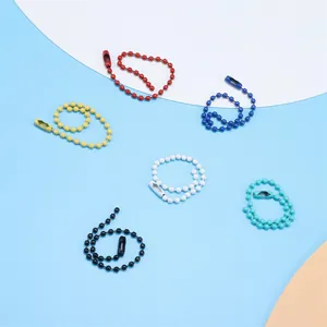 Detailed view of colorful painted metal bead chains for DIY crafts and tag hanging.
