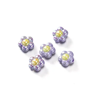 Iridescent purple acrylic flower beads with yellow centers for DIY jewelry making