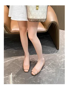 Apricot patent leather square toe flats with decorative buckle and low chunky heel