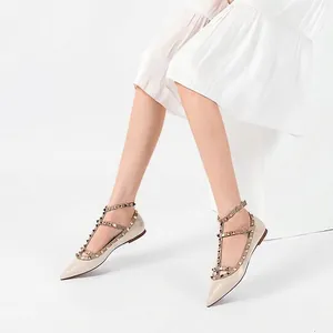 Elegant beige patent leather studded pointed-toe flats with multi-strap design for women