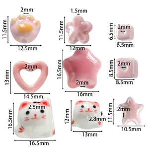 Detailed dimensions of pink ceramic beads in cat paw star and heart shapes for DIY