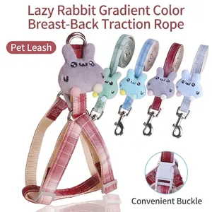 Detailed view of plaid pet harness set with a cute plush rabbit and adjustable buckle.