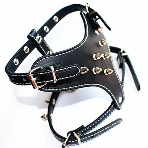 Punk spiked PU leather dog harness with adjustable buckles and white decorative stitching detail.