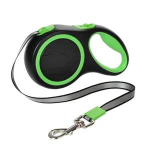 Detail view of automatic retractable dog leash with reflective strap and metal hook