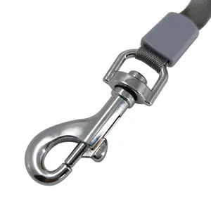 Detailed macro view of heavy-duty chrome-plated metal snap hook for retractable pet leash