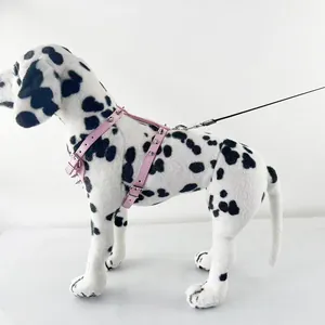 Punk style pink PU leather dog harness with metal studs on Dalmatian prop