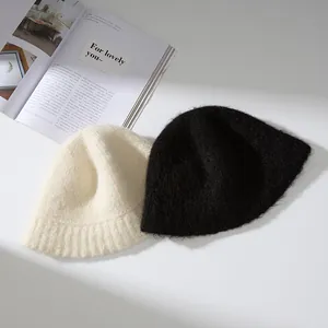 Minimalist winter alpaca wool bucket hats for women, available in black and white