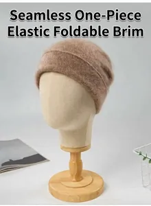 Detailed view of brown brushed silk cashmere knitted beanie on mannequin head stand