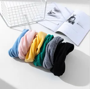 Selection of colorful 100% merino wool knitted neck warmers for cycling and winter