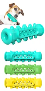 Durable spiked dog bone toy for tooth cleaning shown in turquoise green and yellow colors