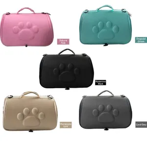 Breathable EVA pet carrier for cats and dogs available in five colors with paw design