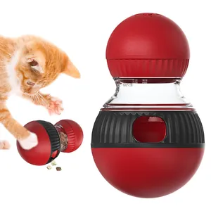 Interactive red and black tumbler cat toy slow feeder ball with transparent chamber