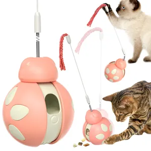Interactive ladybug cat tumbler toy with teaser wand and food dispenser feature.