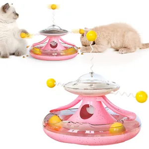 Interactive pink UFO cat toy featuring multi-level track balls and a spring teaser wand
