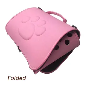Pink foldable EVA pet carrier bag for cats and dogs with breathable holes and paw print