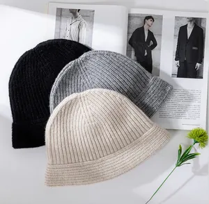 Set of three premium pure wool knitted bucket hats in classic black, grey, and beige