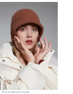 Close-up of a stylish brown pure wool knitted bucket hat for women winter warmth