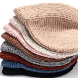 Stack of colorful warm wool ribbed knitted bucket hats for women in various shades