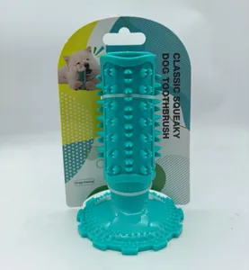 Vue détaillée de la brosse à dents sonore pour chien avec base à ventouse bleue
