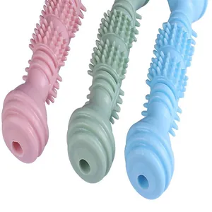 Primo piano di resistenti giocattoli da masticare a forma di manubrio per cani in gomma.