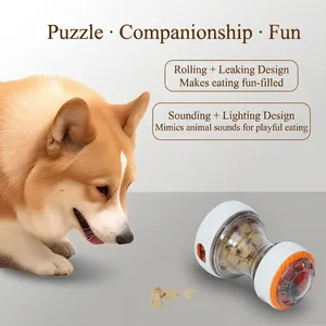 Jouet interactif pour chien avec mangeoire lente, design roulant, sons et lumières.