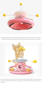 Detail view of cat tumbler toy with anti-toppling base and cat interaction scene