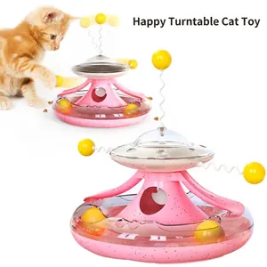 Pink interactive cat turntable toy with tumbler balls and treat dispenser for kittens