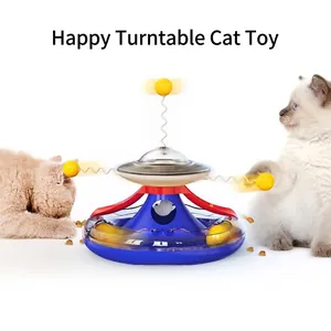 Interactive cat tumbler toy featuring a turntable and food dispenser for indoor cats