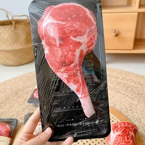 Jouet à mâcher pour chien en forme de steak réaliste dans un emballage de barquette