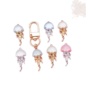 Dijes de medusa de resina iridiscente para joyas DIY con diseño de estilo marino